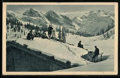 AK Berchtesgaden, Skiläufer auf dem Dach des Gasthof Gotzenalm