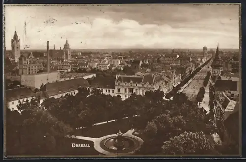 AK Dessau, Stadtansicht mit Brunnen und Hauptstrasse