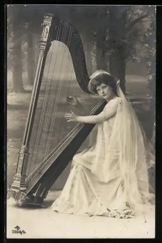 AK hübsche Frau spielt Harfe, Bonne Annee