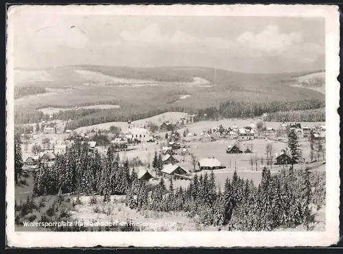 AK Harrachsdorf im Riesengebirge, Ortsansicht vom Berghang im Winter