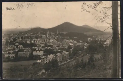 AK Hauida, Ortsansicht mit Kirche vom Berghang aus
