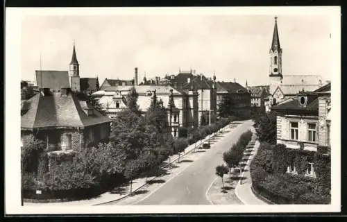 AK Cheb, Strassenpartie mit Kirche