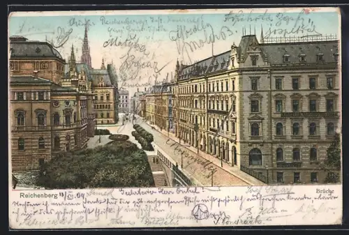 AK Reichenberg / Liberec, Strassenpartie mit Brücke