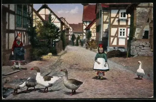 AK Hessische Trachten, Dorfstrasse und Kinder mit Gänsen in der Schwalm