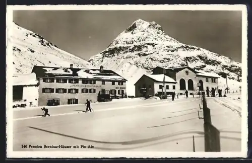 AK Pontresina, Pension Bernina-Häuser mit Piz Alv im Schnee