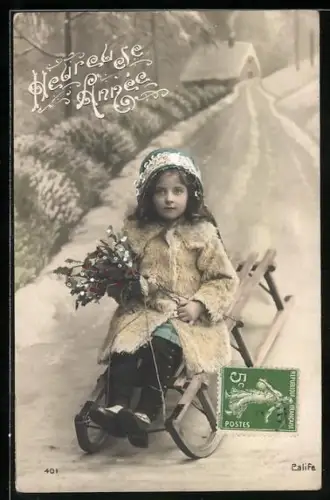 AK Mädchen mit Mistelzweig auf einem Schlitten