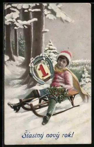 AK Kind auf einem Schlitten mit Hufeisen und Mistelzweig