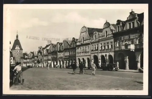 AK Domazlice, Strassenpartie mit Hotel Kresl, Turm, Arkaden