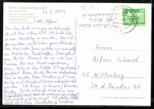 AK Berlin, Karl-Marx-Allee mit Conzertcafe Mockba und Funkturm bei Nacht