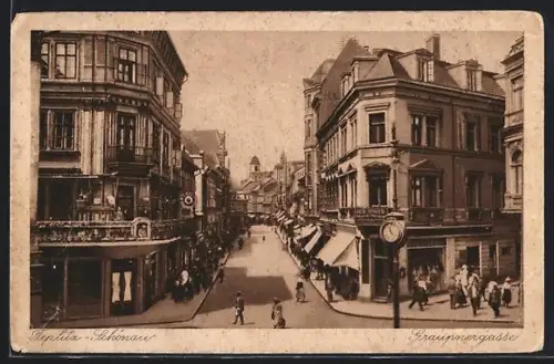 AK Teplitz-Schönau, Graupnergasse, Strassenkreuzung mit Geschäften u. Uhr