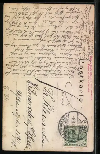 Foto-AK Gruppe in Trachten mit einem Spinnrad