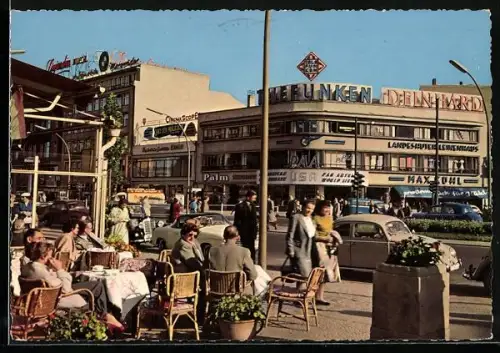 AK Berlin-Charlottenburg, Kurfürstendamm mit Geschäften und Strassencafé