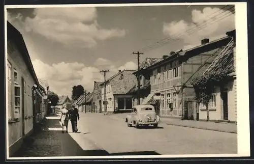 Foto-AK Walsrode, Mootstrasse mit Geschäften ca. 1950