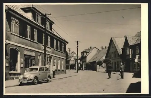Foto-AK Walsrode, Mootstrasse mit Geschäften ca. 1950