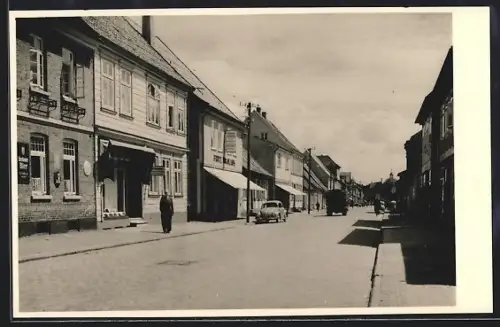 Foto-AK Walsrode, Mootstrasse mit Geschäften ca. 1950