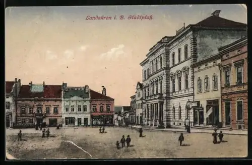 AK Landskron i. B., Stadtplatz mit Säulenportal-Gebäude