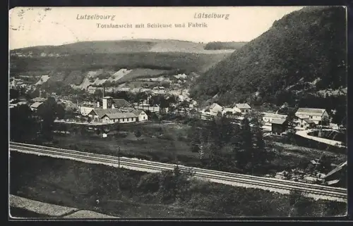 AK Lutzelbourg, Vue du village avec écluse et usine