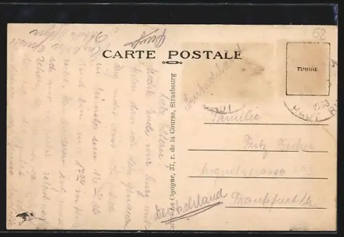 AK Munster, Rue Sébastopol avec église en arrière-plan