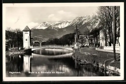 AK Payerbach, Flusspartie mit Brücke vor Raxalpen