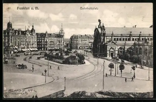 AK Frankfurt a. M., Bahnhofsplatz mit Bahnhof und Strassenbahn aus der Vogelschau