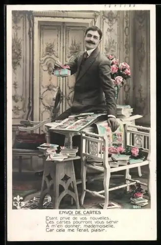 AK Mann mit Ansichtskartenalbum, Ansichtskartengeschichte