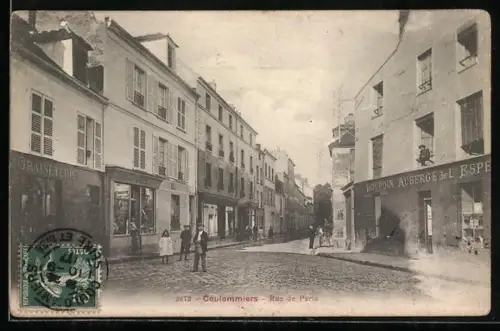 AK Coulommiers, Rue de Paris animée avec passants et commerces