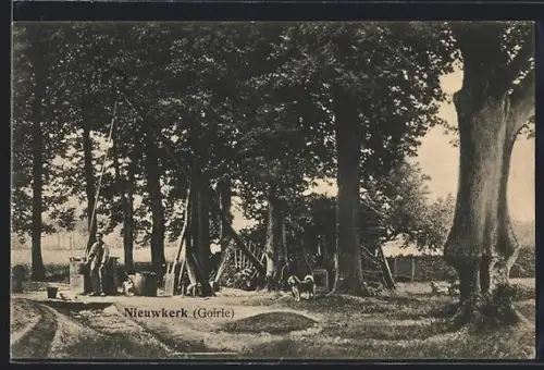 AK Nieuwkerk Goirle, Mann an einem Brunnen, Hund
