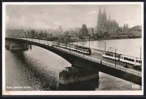 AK Köln, Deutzer Brücke mit Strassenbahnen
