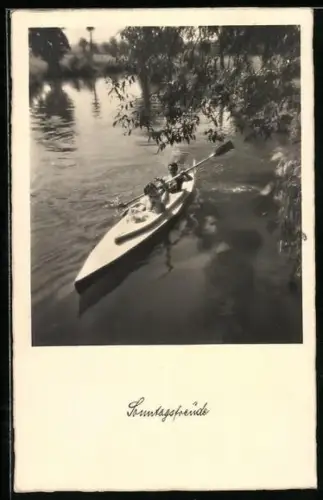 AK Paar in einem Kanu