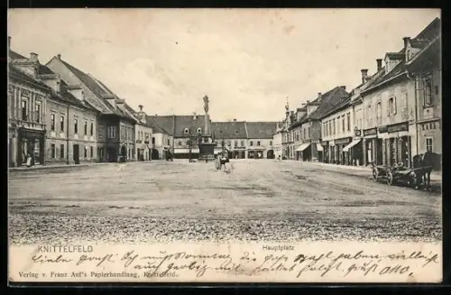 AK Knittelfeld, Hauptplatz mit Geschäften und Säulendenkmal, Panorama