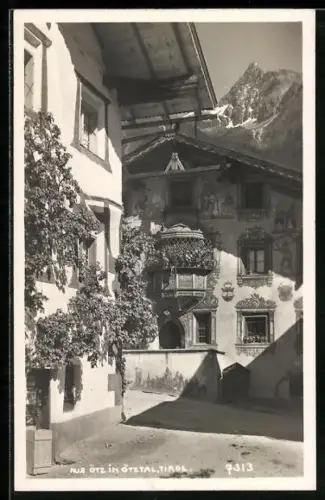 AK Ötz im Ötztal, Ortspartie mit bemaltem Haus