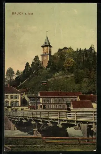AK Bruck a. Mur, Ortspartie mit Brücke und Kirche