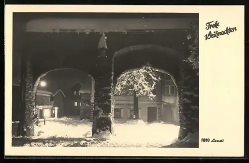 AK Schladming, Ortspartie im Winter mit Tabak-Trafik u. Torbögen, Weihnachtsgruss