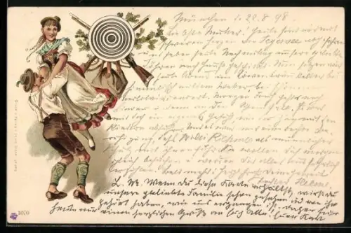 AK Paar in Tracht mit Zielscheibe beim Schützenfest