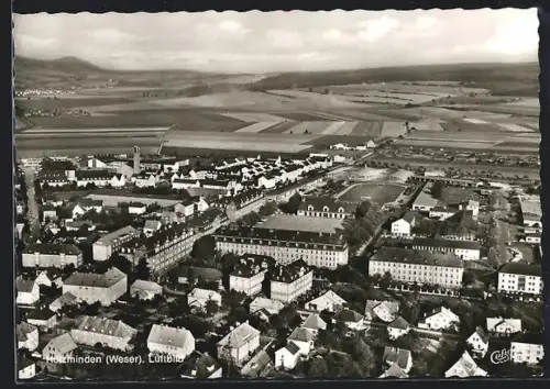 AK Holzminden /Weser, Fliegeraufnahme des Ortes mit Umgebung