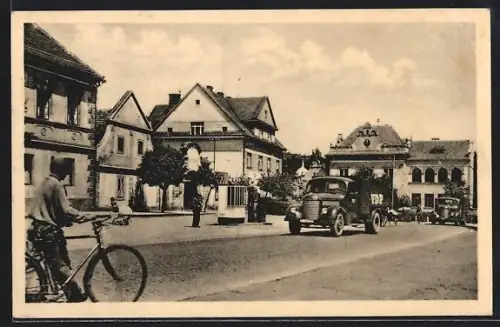 Künstler-AK Uvaly, Cástecný pohled, Ulice