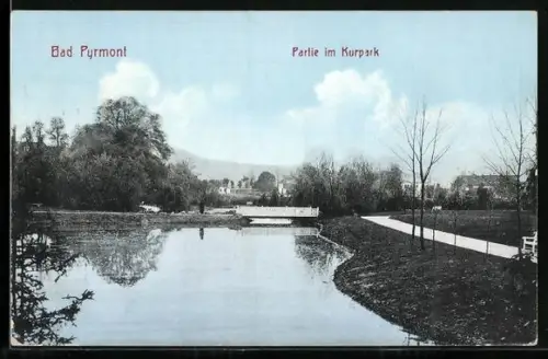 AK Bad Pyrmont, Partie im Kurpark mit Brücke