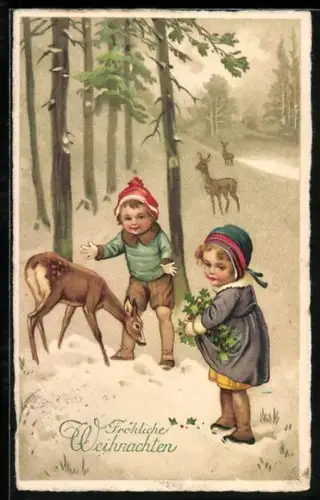 AK Kleines Paar mit Rehen im Winterwald, Weihnachtsgruss