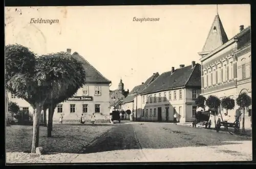 AK Heldrungen, Hauptstrasse mit Gasthaus zum Schwan