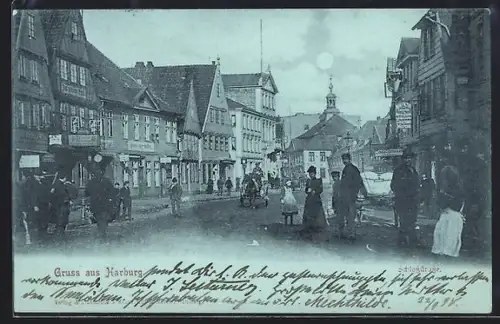 Mondschein-AK Harburg, Passanten in der Schlossstrasse