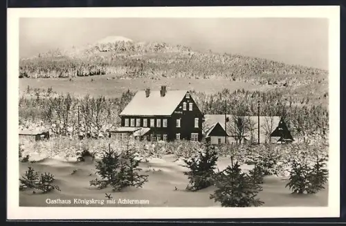AK Braunlage, Forsthaus Königskrug mit Achtermann im Winter