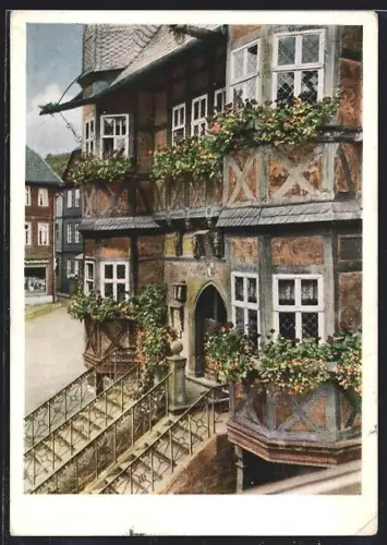 AK Wernigerode /Harz, Teilansicht des blumengeschmückten Rathauses