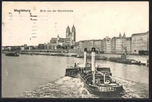 AK Magdeburg, Blick von der Strombrücke, Stadtpanorama mit Frachtdampfer