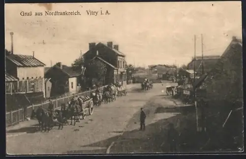 AK Vitry i. A., Soldaten mit Pferdekutschen im Ort