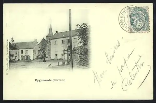 AK Eygurande /Corrèze, Vue du centre du village avec église et bâtiments adjacents