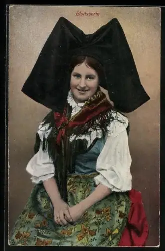 AK Elsässerin in Tracht sitzt auf einem Stuhl