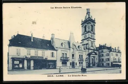 AK Lure, La Grande-Rue et l`église avec pharmacie et bâtiments emblématiques