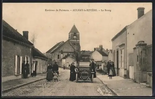 AK Aulnay-la-Rivière, Le Bourg avec habitants devant l`église
