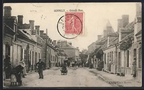 AK Sennely, Grande Rue animée avec habitants et commerces