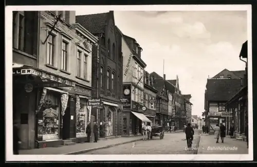 AK Uelzen, Bahnhofstrasse mit Samenhandlung J. H. Deicke